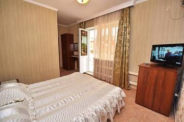 Фото номера Двухместный номер с 2 отдельными кроватями Гостиница Guest House Georgy г. Кабардинка 4