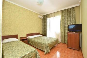 Фото номера Трехместный номер Гостиница Guest House Georgy г. Кабардинка 4