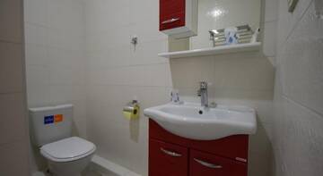 Фото номера Стандартный семейный номер Гостиница Capri Hotel г. Кабардинка 8