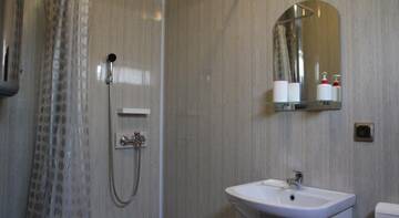 Фото номера Трехместный номер с террасой Гостиница Guest House Sovetov 7 г. Кабардинка 6
