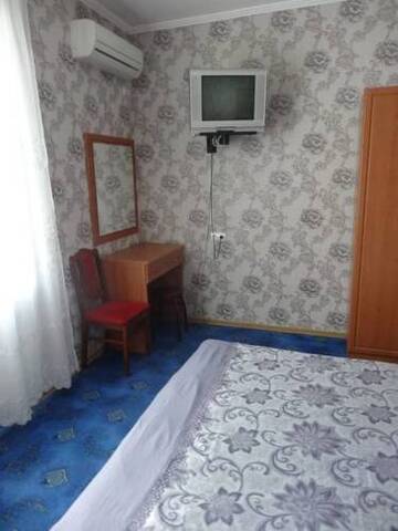 Фото номера  Трехместный номер с ванной комнатой Гостиница Solnechnyi Rai г. Кабардинка 27