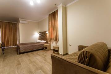 Фото номера  Стандартный четырехместный номер Гостевой дом Panorama Resort г. Кабардинка 4