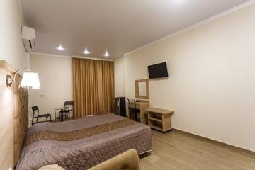 Фото номера  Стандартный четырехместный номер Гостевой дом Panorama Resort г. Кабардинка 5